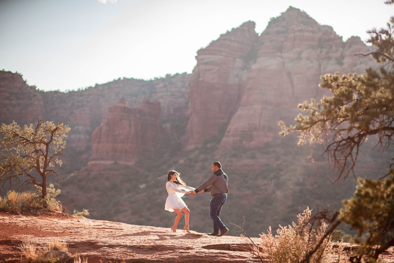 bride and groom dancing in the arizona desert