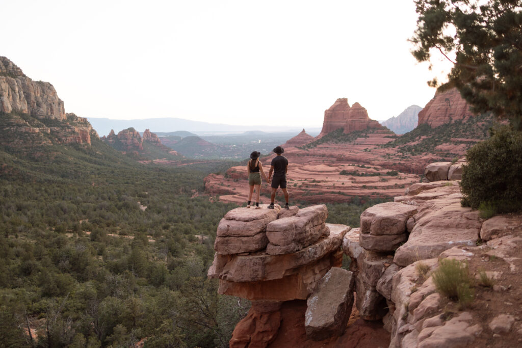 bride and groom look at view in Sedona
